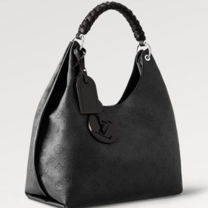 Like new Louis Vuitton Carmel Hobo bag in black.